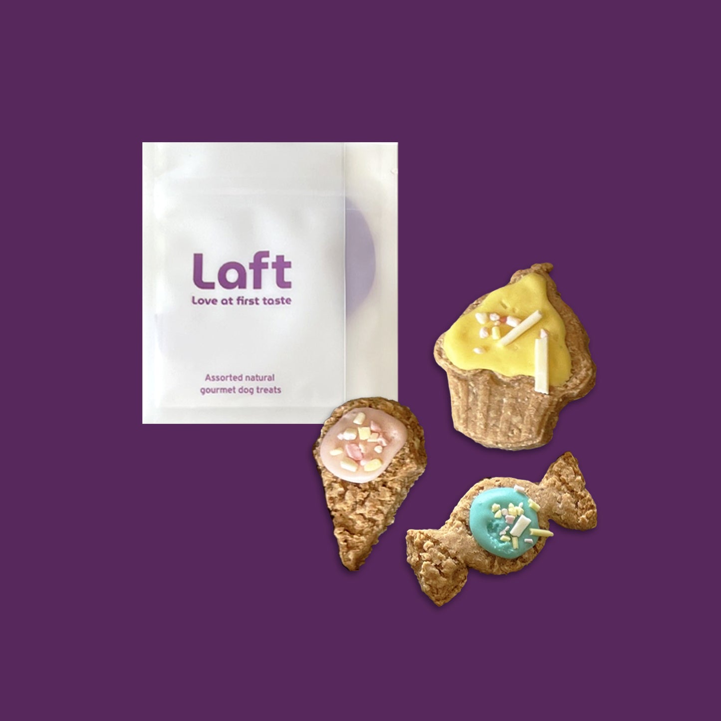 A white Laft Pet treat pouch placed next to a cupcake, a lolly, and a ice-cream cone cookies on a dark purple background.