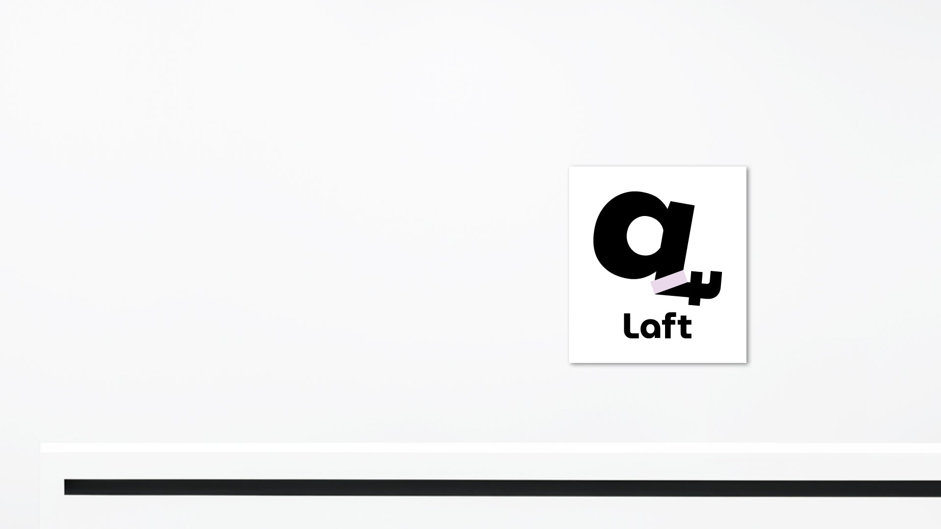 The entrance of Laft Pet's office, featuring its logo displayed on the wall.